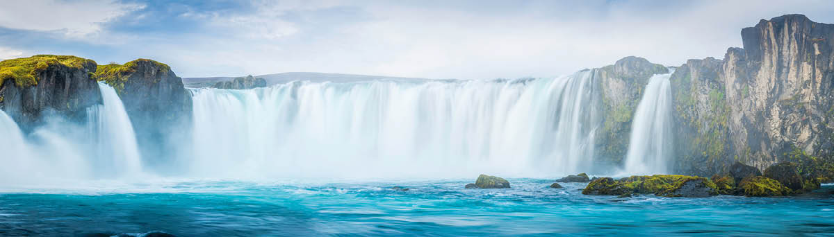 The turquoise waters of the Skjálfandafljót river cascading over the spectacular Godafoss waterfalls in the Arctic north of Iceland  ProPhoto RGB profile for maximum color fidelity and gamut 