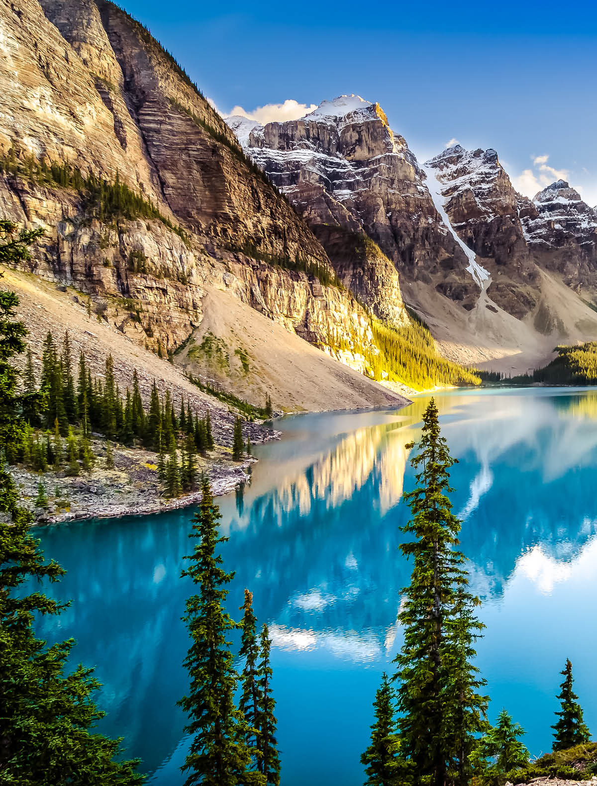 Landscape sunset view of Morain lake and mountain range, Alberta, Canada