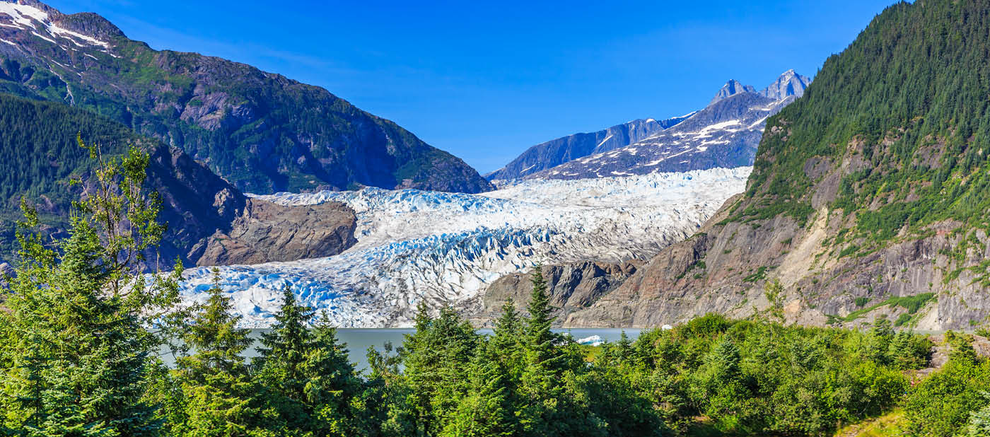 Juneau, Alaska. Mendenhall Glacier Viewpoint with reflection in the lake.