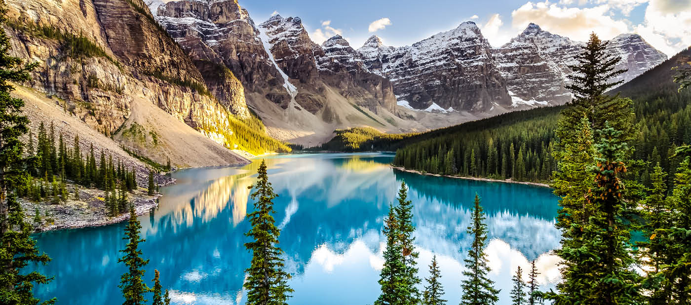 Landscape sunset view of Morain lake and mountain range, Alberta, Canada