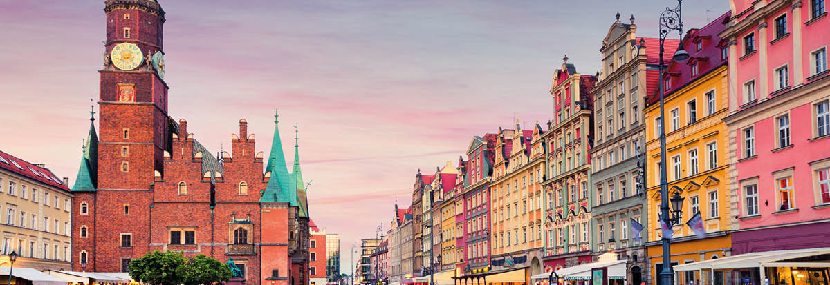 Colorful evening scene on Wroclaw Market Square with Town Hall  Sunset in historical capital of Silesia, Poland, Europe  Artistic style post processed photo 