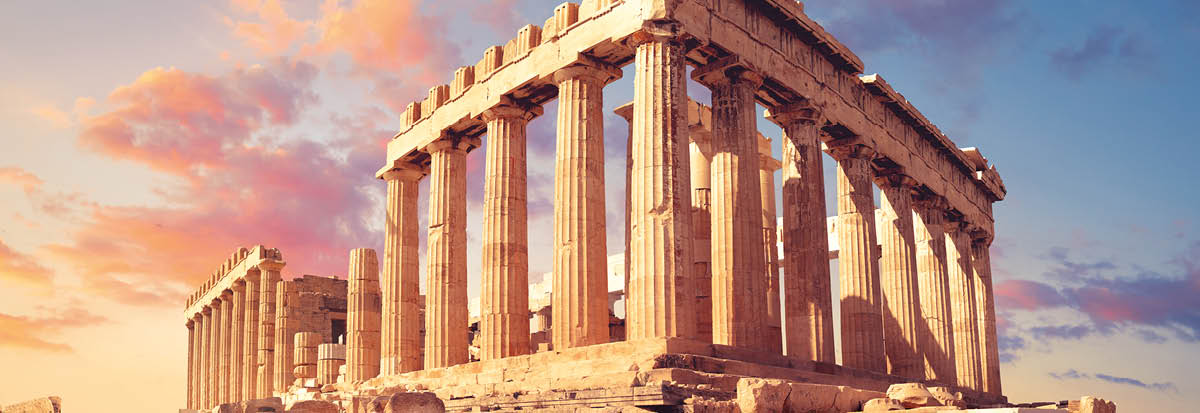 Parthenon temple on a sunset with pink and purple clouds  Acropolis in Athens, Greece