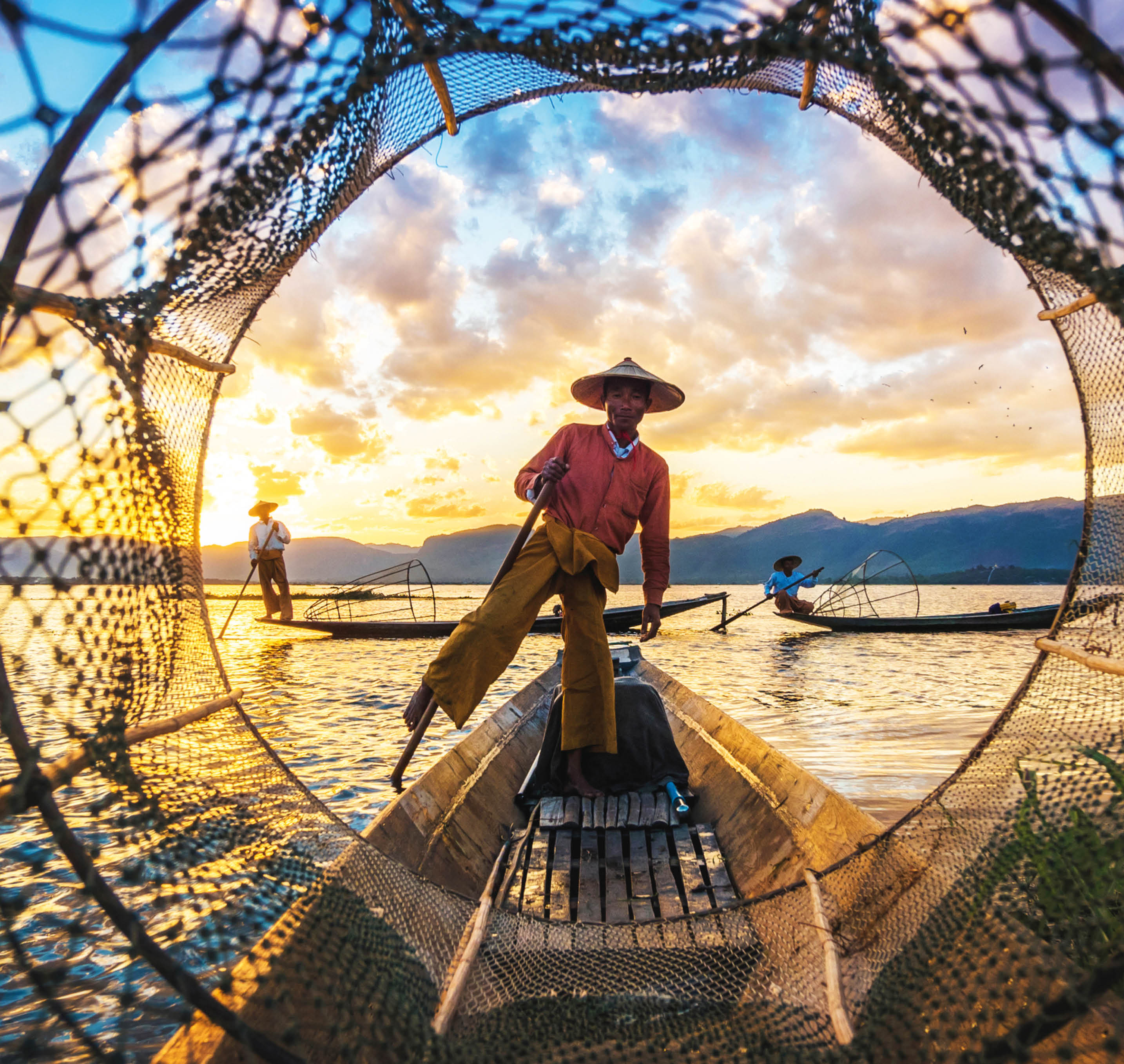 Inle Lake Intha fishermen at sunset in Myanmar (Burma).