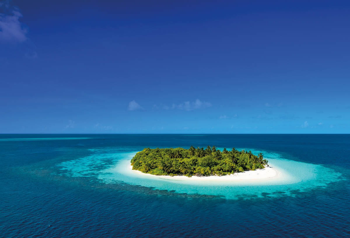 Isolated tropical island middle of ocean