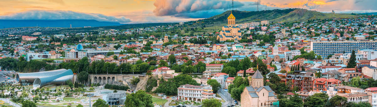 Evening View Of Tbilisi At Colorful Sunset, Georgia  Summer Cityscape  On Photograph Visible A New Concert Hall, Avlabar Residence - Presidential Administration Of Georgia, Holy Trinity Cathedral Of Tbilisi, Metekhi Church