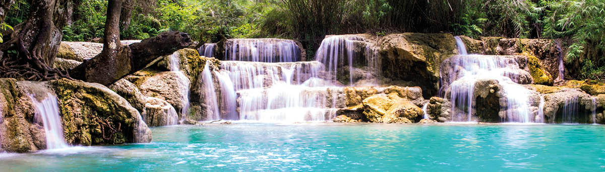 The Kuang Si Falls, a k a  Kuang Xi or Tat Kuang Si Waterfalls is located about 29 km south of Luang Prabang in Laos in SE Asia