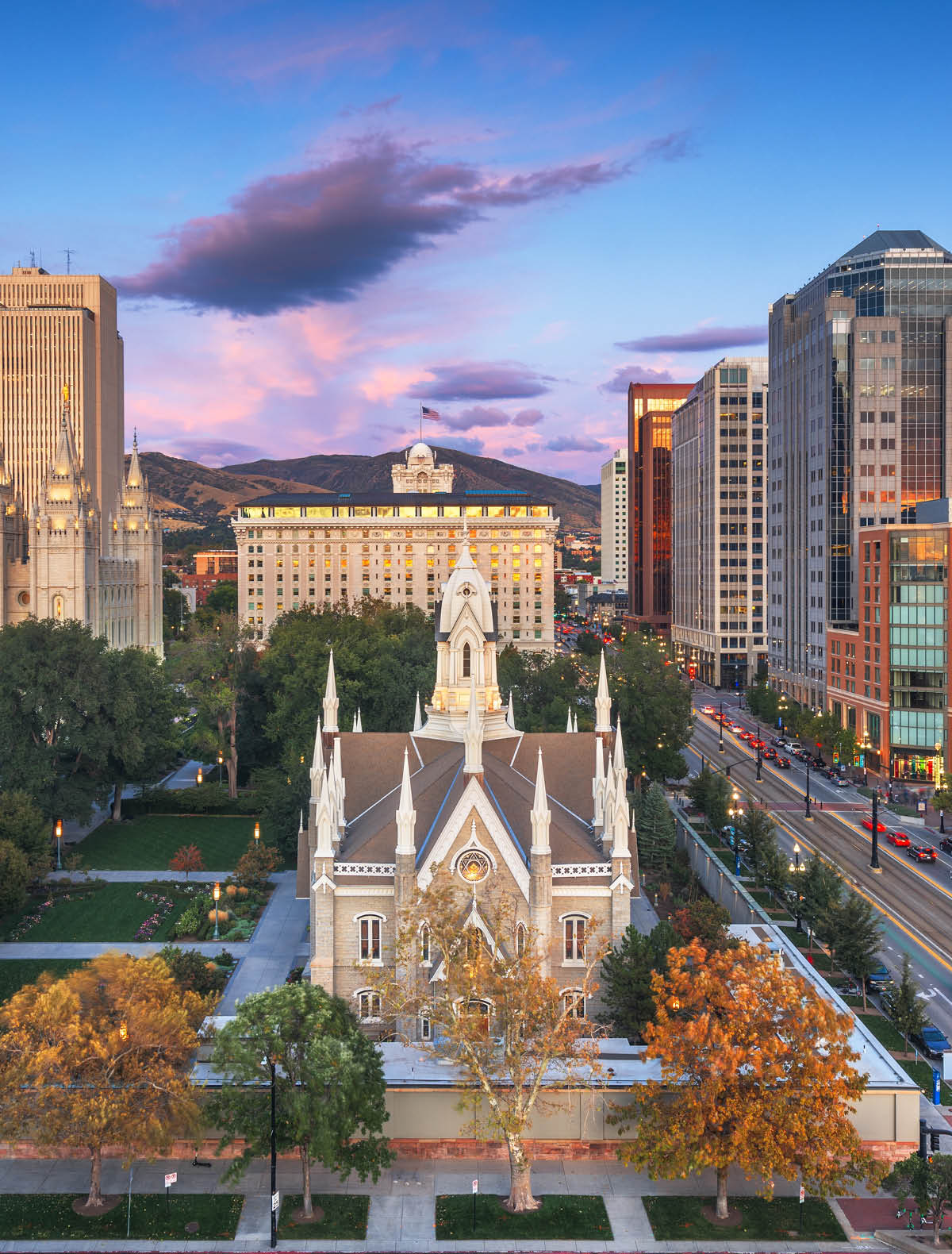 Salt Lake City, Utah, USA downtown cityscape over Temple Square with autumn foliage.