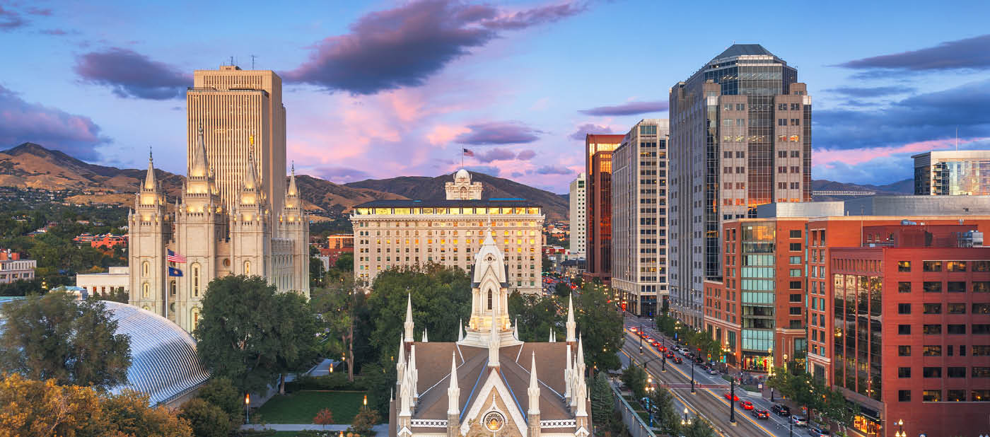 Salt Lake City, Utah, USA downtown cityscape over Temple Square with autumn foliage.