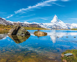 Beautiful panoramic summer view of the Stellisee lake with reflection of the iconic Matterhorn (Monte Cervino, Mont Cervin) and clear blue sky on water surface, Swiss Alps, Zermatt, Switzerland, Europe 