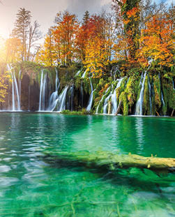 Stunning colorful autumn landscape with spectacular lake and waterfalls in Plitvice lakes National Park, Croatia, Europe
