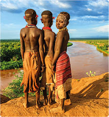 Young boys from Karo tribe  The Karo tribe is a tribe that lives in the southwestern region of the Omo Valley near Kenya, Africa  They are largely pastoralists http:  bem 2be pl IS ethiopia_380 jpg