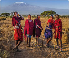 African warriors from Maasai tribe, Mount Kilimanjaro on the background, central Kenya, Africa  Maasai tribe inhabiting southern Kenya and northern Tanzania, and they are related to the Samburu 