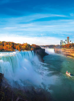 Niagara waterfall the big water fall between USA and Canada with Autumn and boat this immage can use for travel, waterfall, nature and united states of America concept
